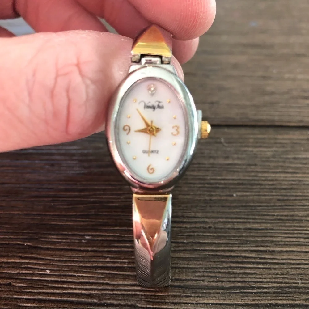 Sliver and gold linked bracelet watch